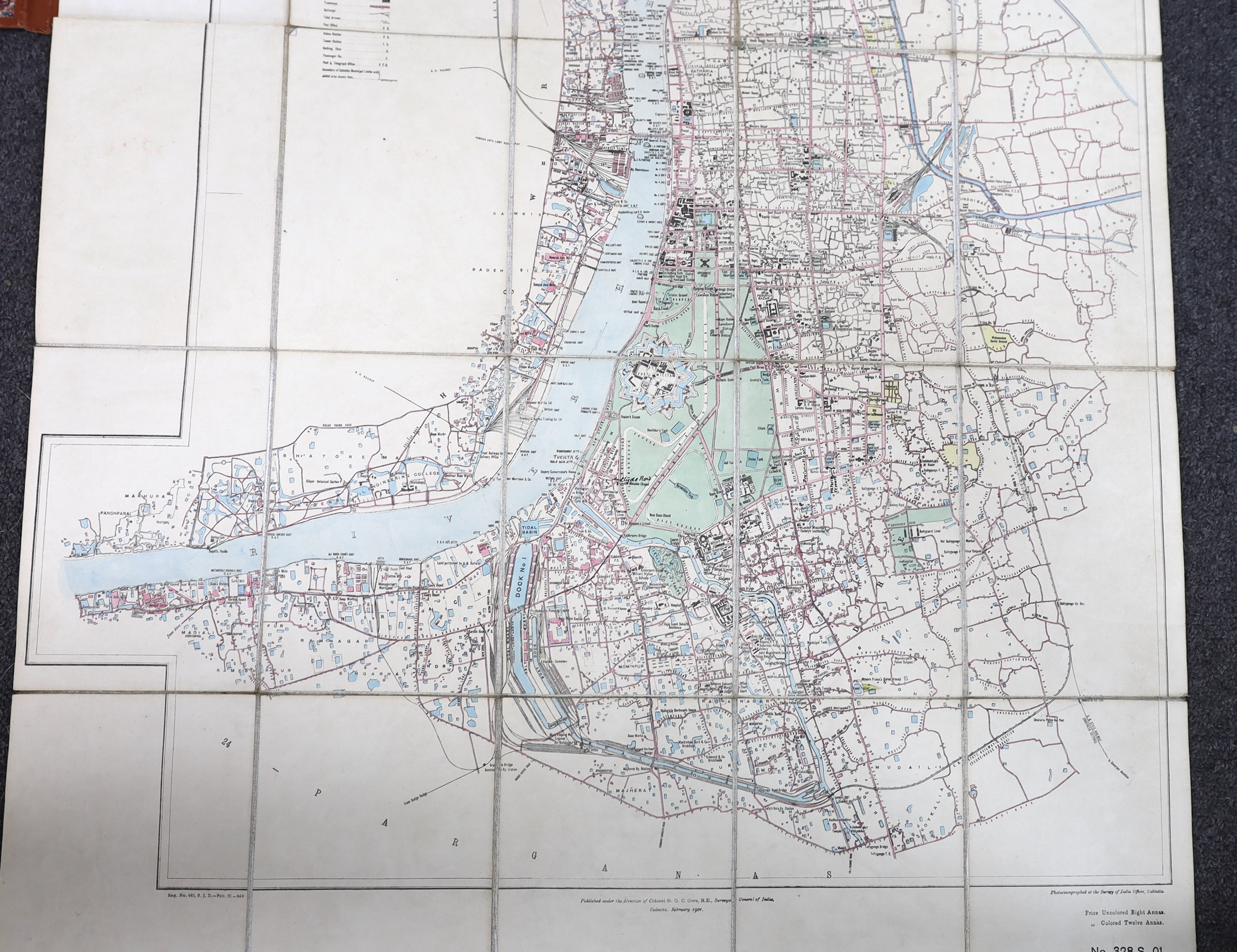 Plan of the City of Calcutta ... 3rd edition. coloured and folded on linen, opens to approx. 60x 55cm. within ruled borders, engraved title and key, scale: 3ins. to mile, contained within gilt lettered cloth covers. Surv